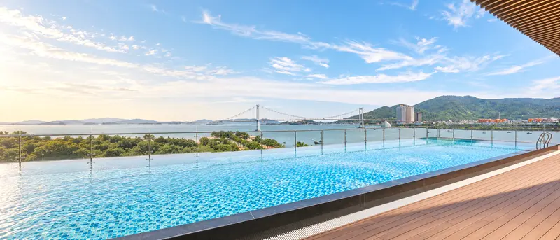 Rooftop pool overlooking the Han River and the Thuận Phước Bridge in Da Nang